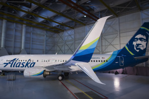 An Alaska Airlines 737-800, newly painted in the airline’s 2016 refreshed brand, is ready to be revealed at the airline's maintenance hangar in SeaTac, Washington on Jan. 25, 2016. This month, Alaska Airlines revealed the most substantial updates to its brand in a quarter century. Beginning Jan. 25, Alaska fliers will see the visual updates in new signage at the airport, an all-new airplane paint job, a refreshed website and mobile app, and more.